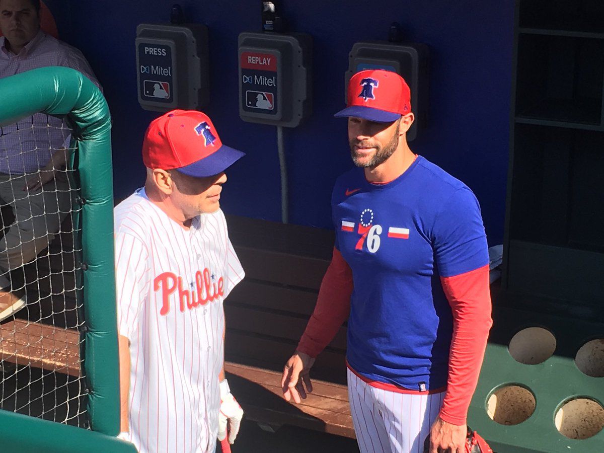 Bruce Willis and Phillies manager Gabe Kapler chat
